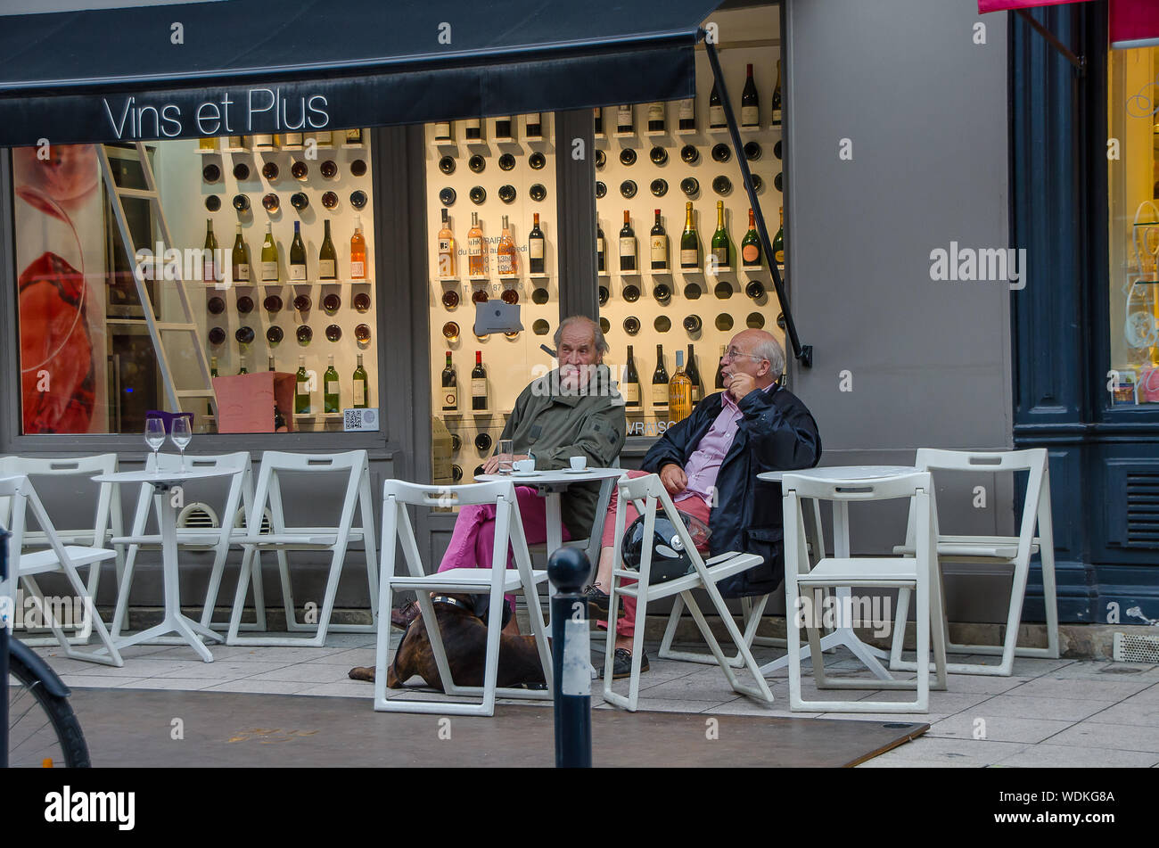 Couple of older men on a terrace in the city of Bordeaux in September 2013. France Stock Photo