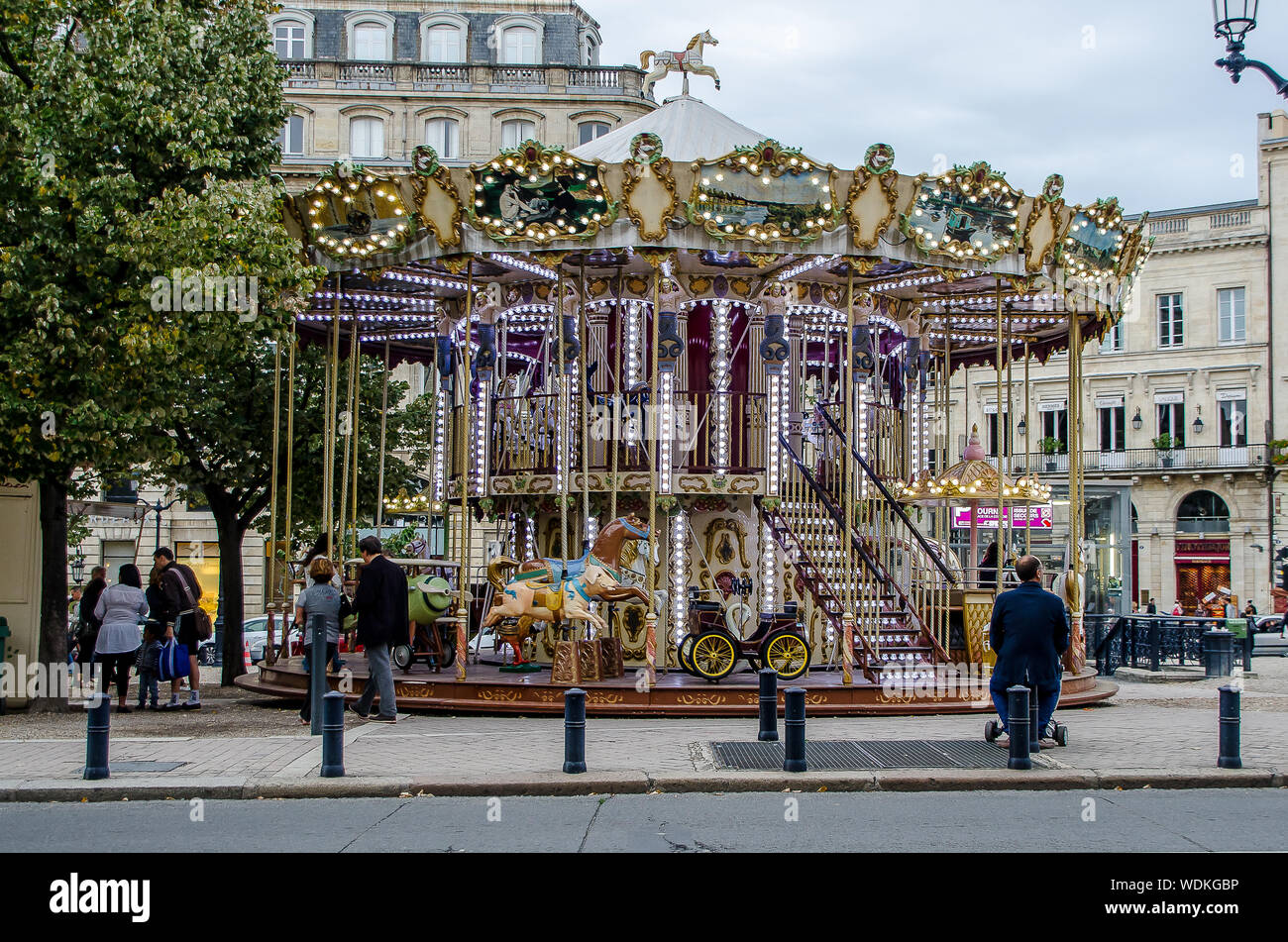 Beautiful children's carousel in the city of Bordeaux in September 2013. France Stock Photo