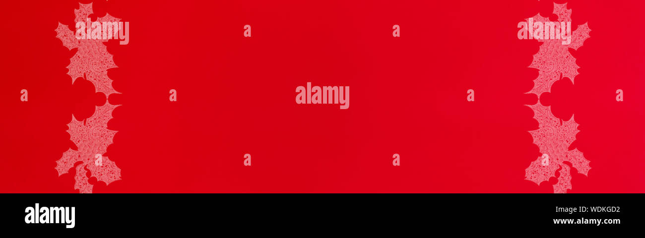 Red background with Christmas ornaments Stock Photo - Alamy