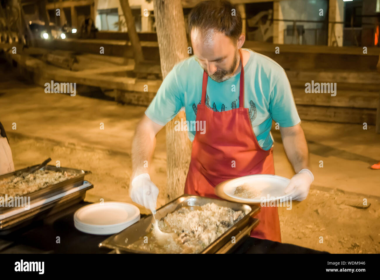 Man Taking Food From Container At Street Stock Photo Alamy