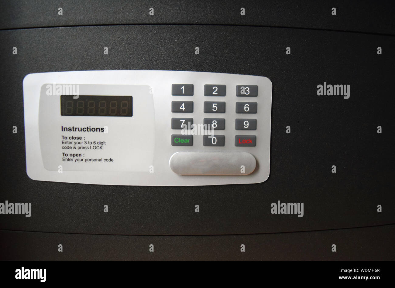 Safe box, code lock on the safe door, closeup Stock Photo