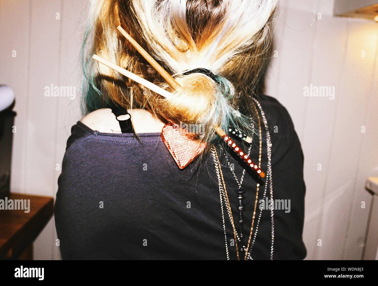 Hair bun chopsticks hi-res stock photography and images - Alamy Hair bun chopsticks hi-res stock photography and images - Alamy