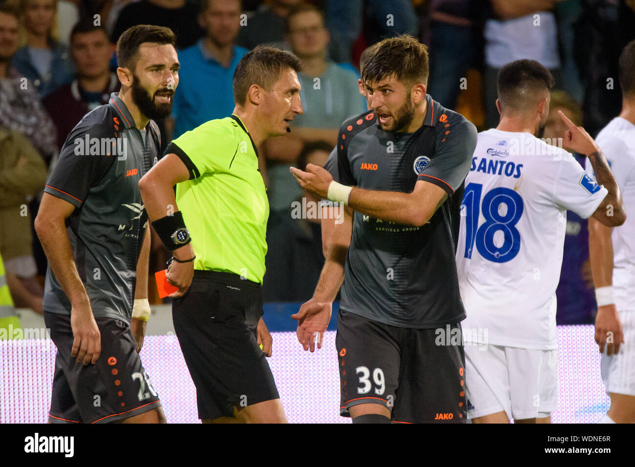 RIGA, Latvia. 29th Aug, 2019. Stefan Panic (L), referee Pawel Gil (C) and Herdi Prenga (R), during UEFA Europa League Play-off 2nd leg football game between team RIGA FC and team København. Skonto stadium, Riga. Credit: Gints Ivuskans/Alamy Live News Stock Photo