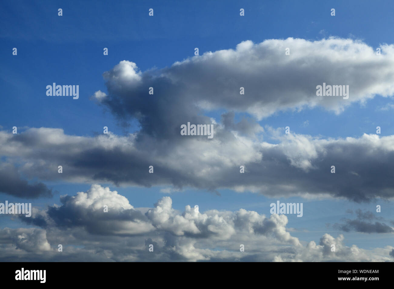 White, grey, dark cloud, clouds, formation, formations, blue sky, skies Stock Photo