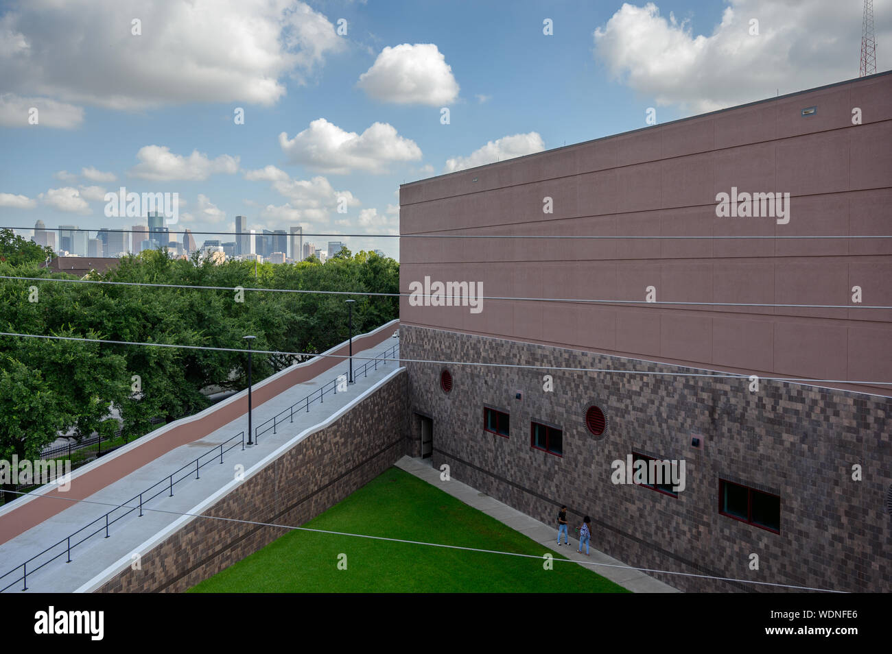 Houston, Texas - August 29, 2019: Health and Physical Education Arena at the Texas Southern University. Houston skyline in the distance. Stock Photo