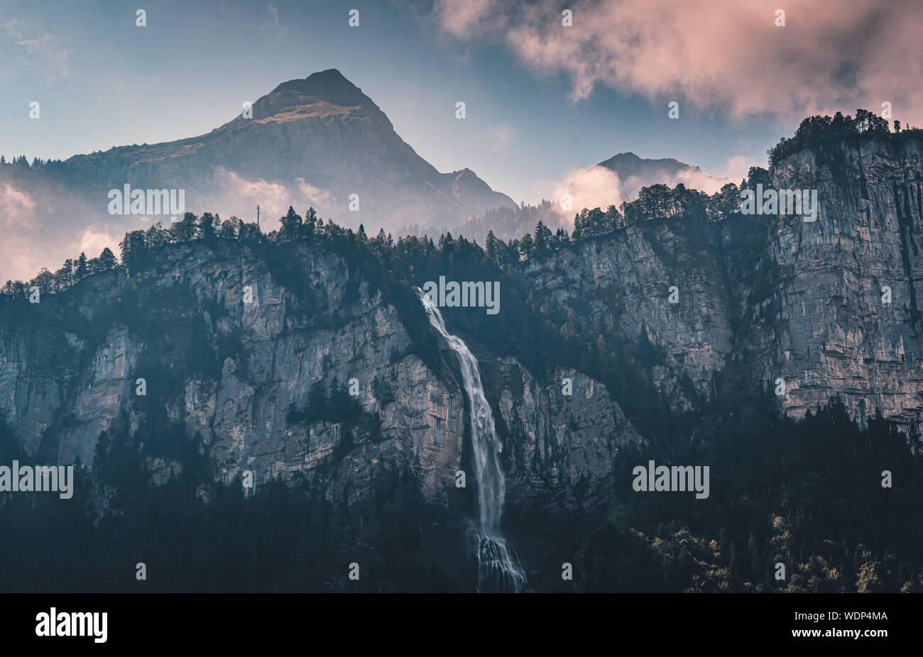 Atmospheric conditions at the famous Reichenbach Falls as seen from Meiringen in the Bernese Oberland of Switzerland. Stock Photo