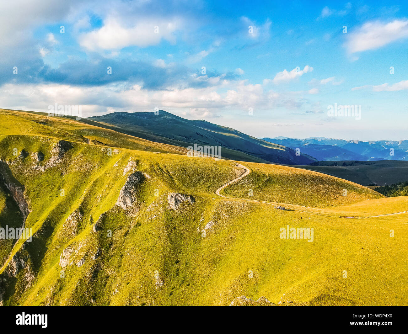 Two offroad cars parked on the mountain cliff in sunset near Travnik city in Bosnia and Herzegovina Stock Photo