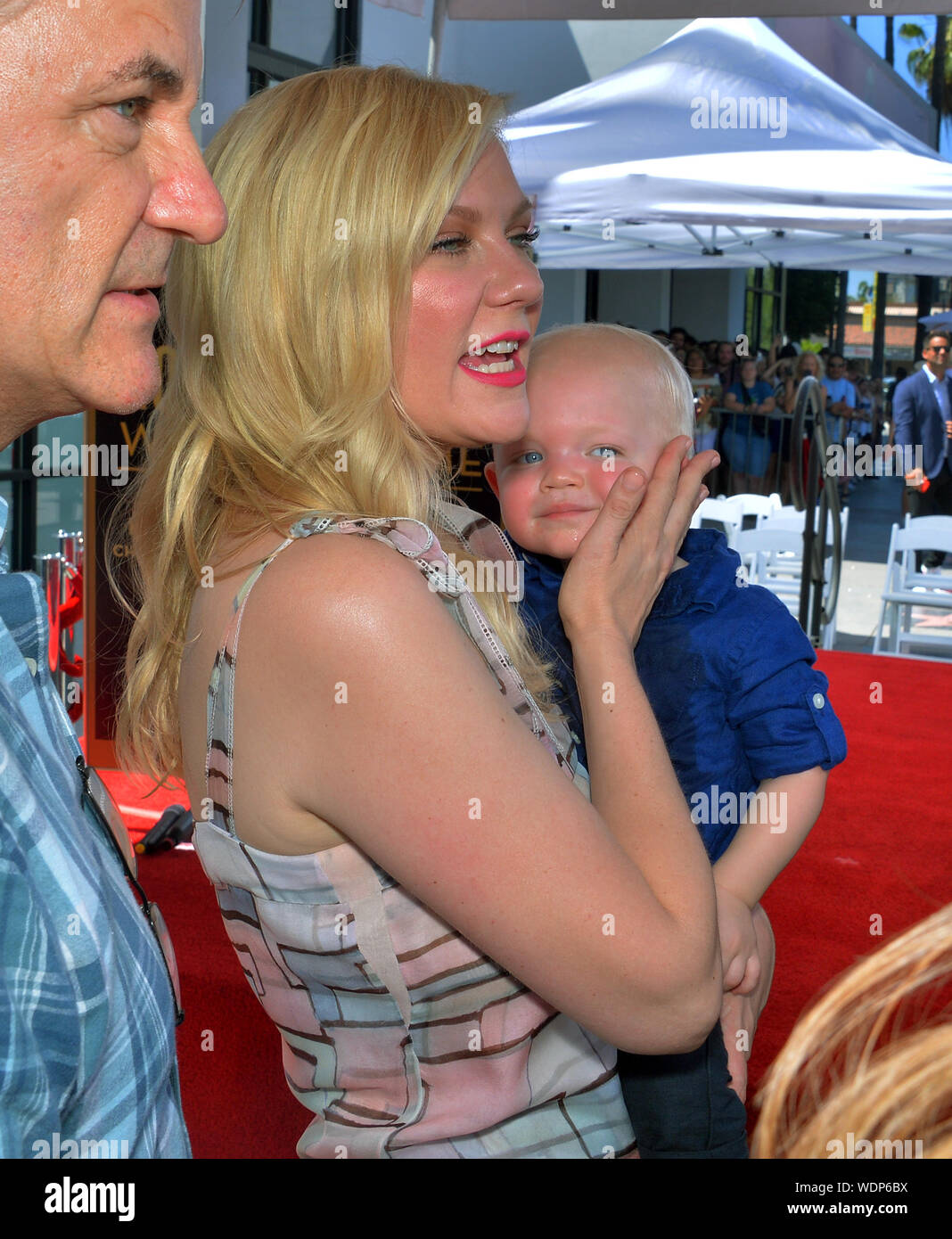 Los Angeles, United States. 29th Aug, 2019. Actress Kirsten Dunst holds her 15-month-old son Ennis Howard Plemons following an unveiling ceremony honoring her with the 2,671st star on the Hollywood Walk of Fame in Los Angeles on Thursday, August 29, 2019. Photo by Jim Ruymen/UPI Credit: UPI/Alamy Live News Stock Photo