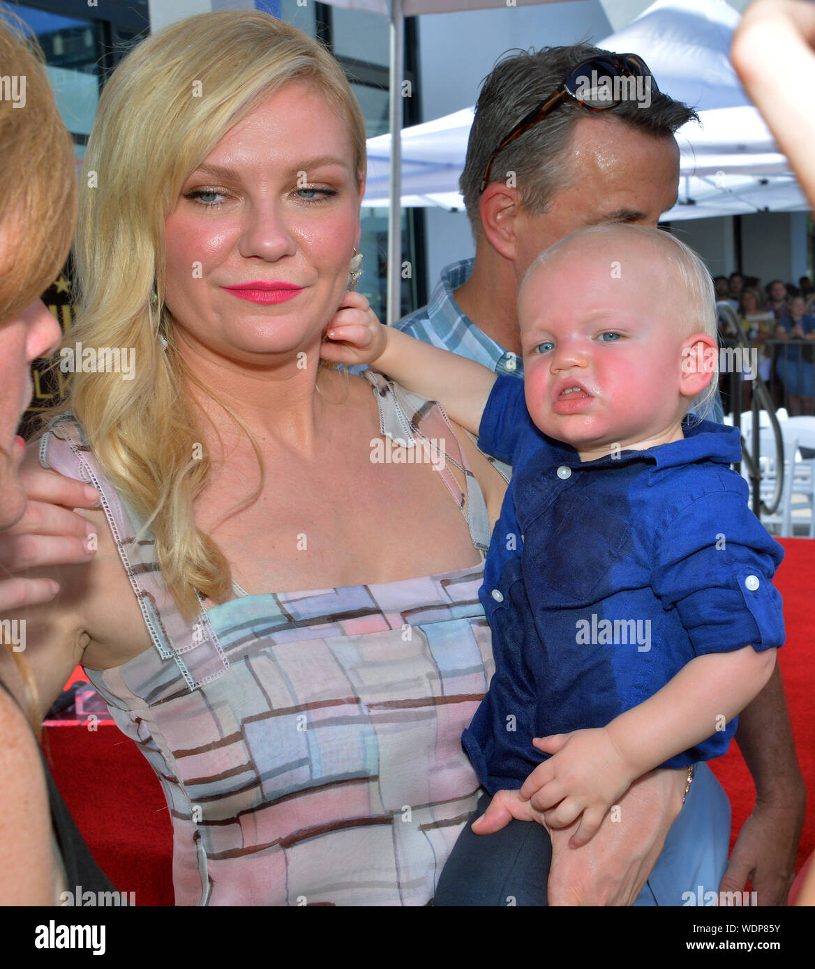 Los Angeles, United States. 29th Aug, 2019. Actress Kirsten Dunst holds her 15-month-old son Ennis Howard Plemons following an unveiling ceremony honoring her with the 2,671st star on the Hollywood Walk of Fame in Los Angeles on Thursday, August 29, 2019. Photo by Jim Ruymen/UPI Credit: UPI/Alamy Live News Stock Photo