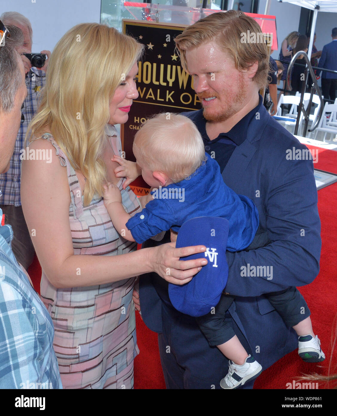Los Angeles, United States. 29th Aug, 2019. Actress Kirsten Dunst is joined by her husband, actor Jesse Plemons and their 15-month-old son Ennis Howard Plemons following an unveiling ceremony honoring her with the 2,671st star on the Hollywood Walk of Fame in Los Angeles on Thursday, August 29, 2019. Photo by Jim Ruymen/UPI Credit: UPI/Alamy Live News Stock Photo