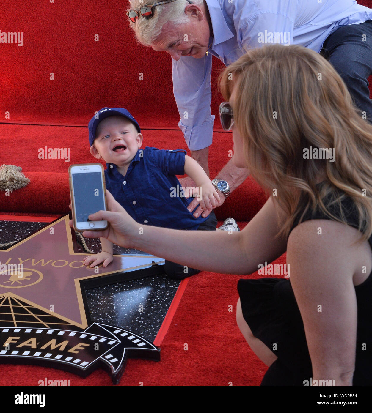 Los Angeles, United States. 29th Aug, 2019. Actress Kirsten Dunst's son, 15-month-old son Ennis Howard Plemons makes a rare apprearance print to an unveiling ceremony honoring his mother with the 2,671st star on the Hollywood Walk of Fame in Los Angeles on Thursday, August 29, 2019. Photo by Jim Ruymen/UPI Credit: UPI/Alamy Live News Stock Photo