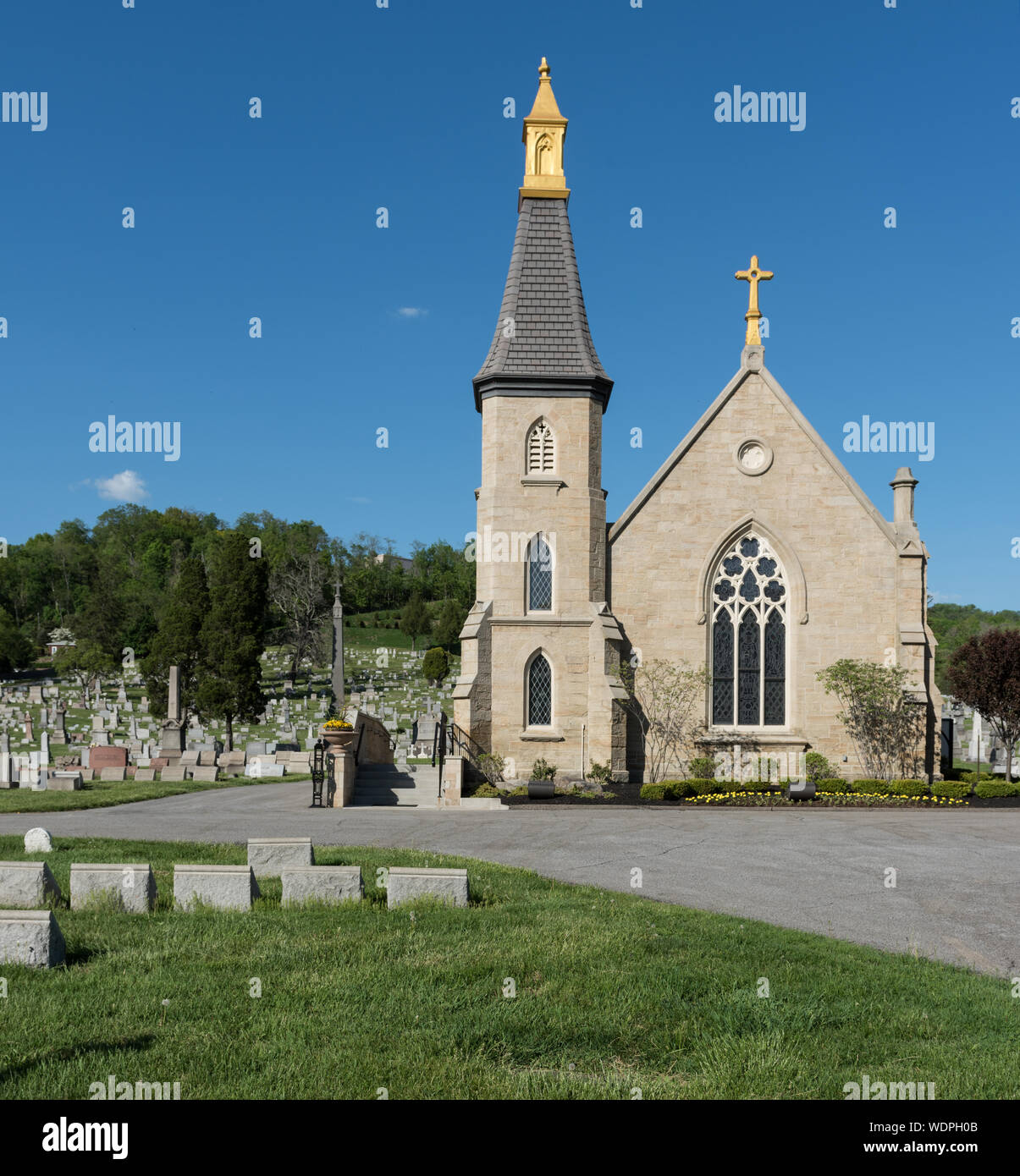 Gravestones and the chapel building at Mount Calvary Cemetery, adjacent