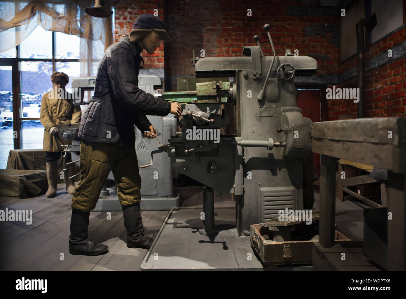 Manufacturing of SVT-40 (Tokarev semi-automatic rifle) at the Tula Arms Plant in November 1941 during World War II, when the plant was evacuated from Tula to Mednogorsk in Orenburg Region. The installation exhibited in the Tula State Museum of Weapons in Tula, Russia. Stock Photo