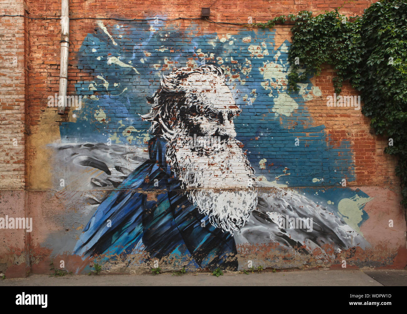 Russian writer Leo Tolstoy depicted in street graffiti by Russian street artist Andrei Shyopot (2016) in Tula, Russia. Stock Photo
