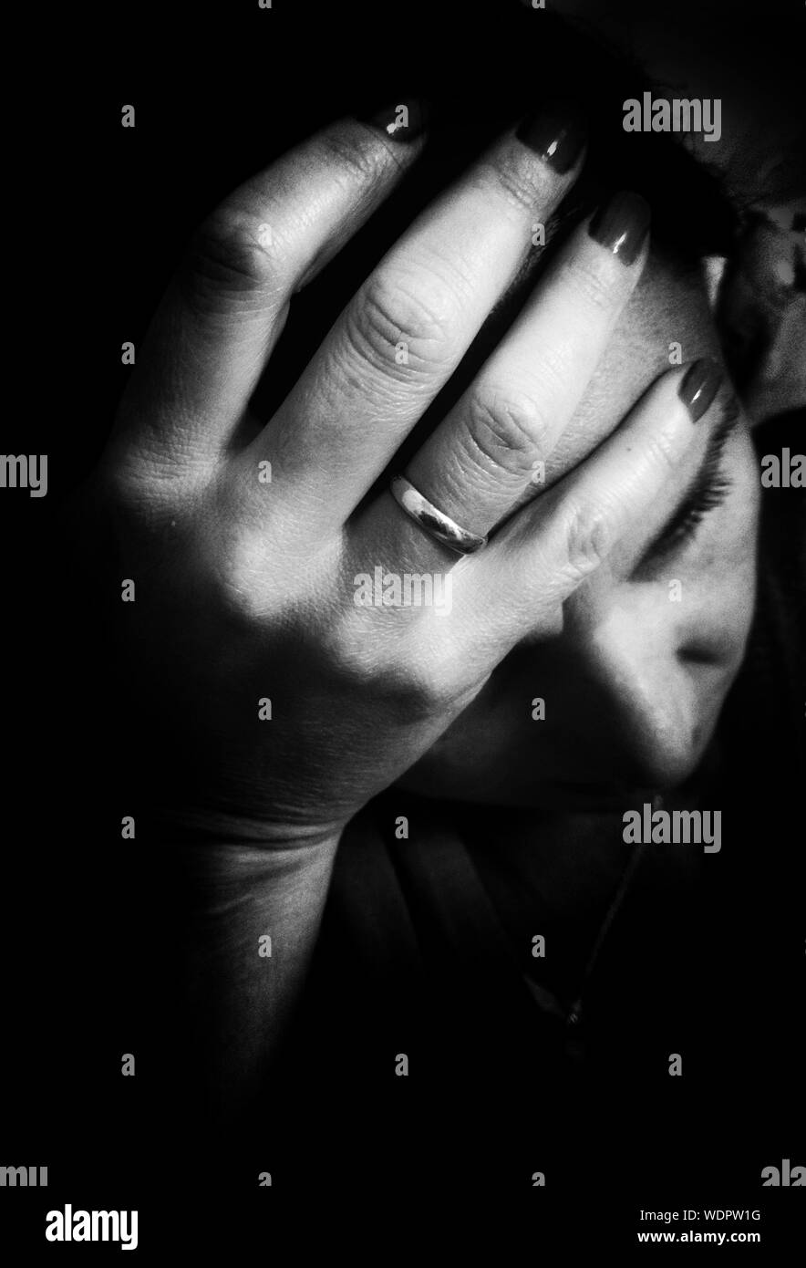 Woman head in hands hi-res stock photography and images - Alamy