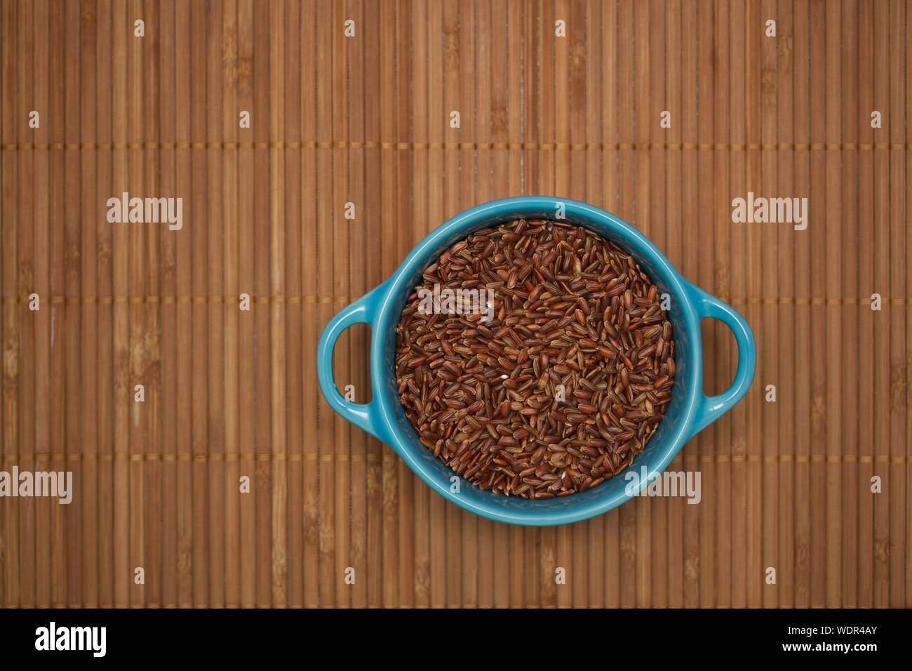 Directly Above View Of Wheat In Bowl Bamboo Mat Stock Photo