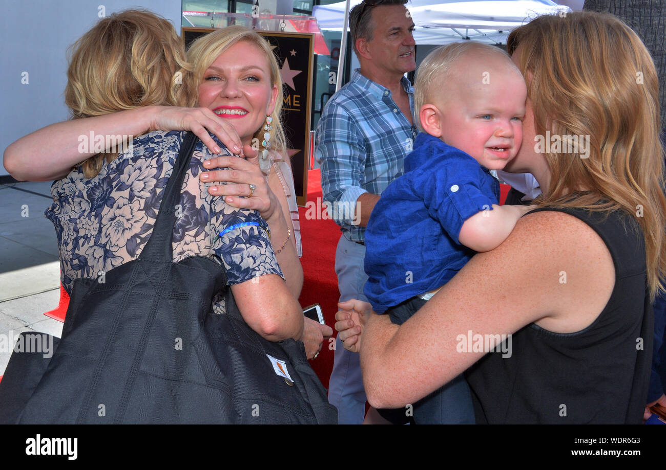 Los Angeles, United States. 29th Aug, 2019. Actress Kirsten Dunst is joined by her 15-month-old son Ennis Howard Plemons (R) following an unveiling ceremony honoring her with the 2,671st star on the Hollywood Walk of Fame in Los Angeles on Thursday, August 29, 2019. Photo by Jim Ruymen/UPI Credit: UPI/Alamy Live News Stock Photo