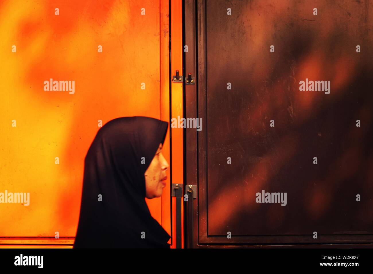 Woman In Hijab In Shadow High Resolution Stock Photography and Images ...