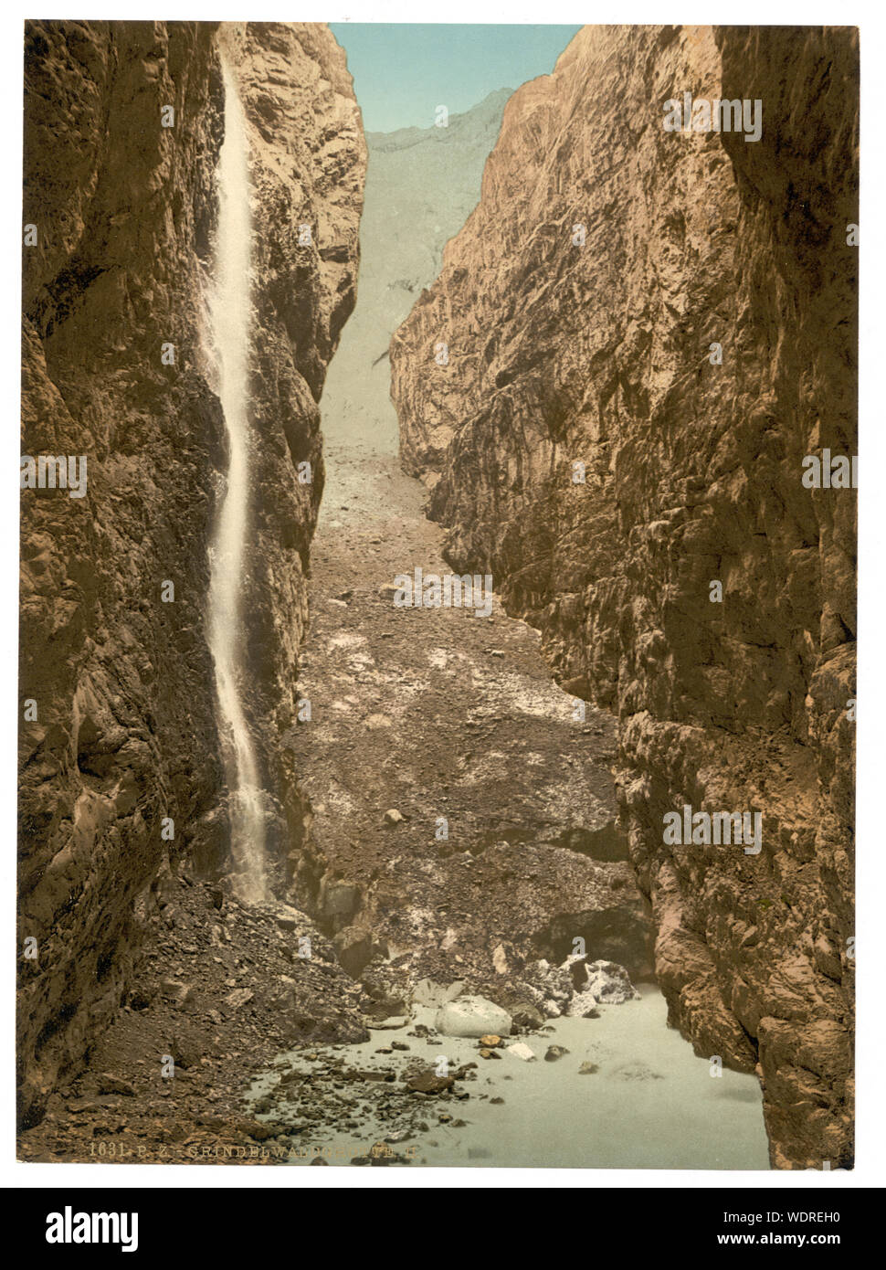 Grindelwald, grotto, II, with waterfall, Bernese Oberland, Switzerland Forms part of: Views of Switzerland in the Photochrom print collection. Title from the Detroit Publishing Co., Catalogue J-foreign section, Detroit, Mich. : Detroit Publishing Company, 1905. Print no. 1631. Stock Photo