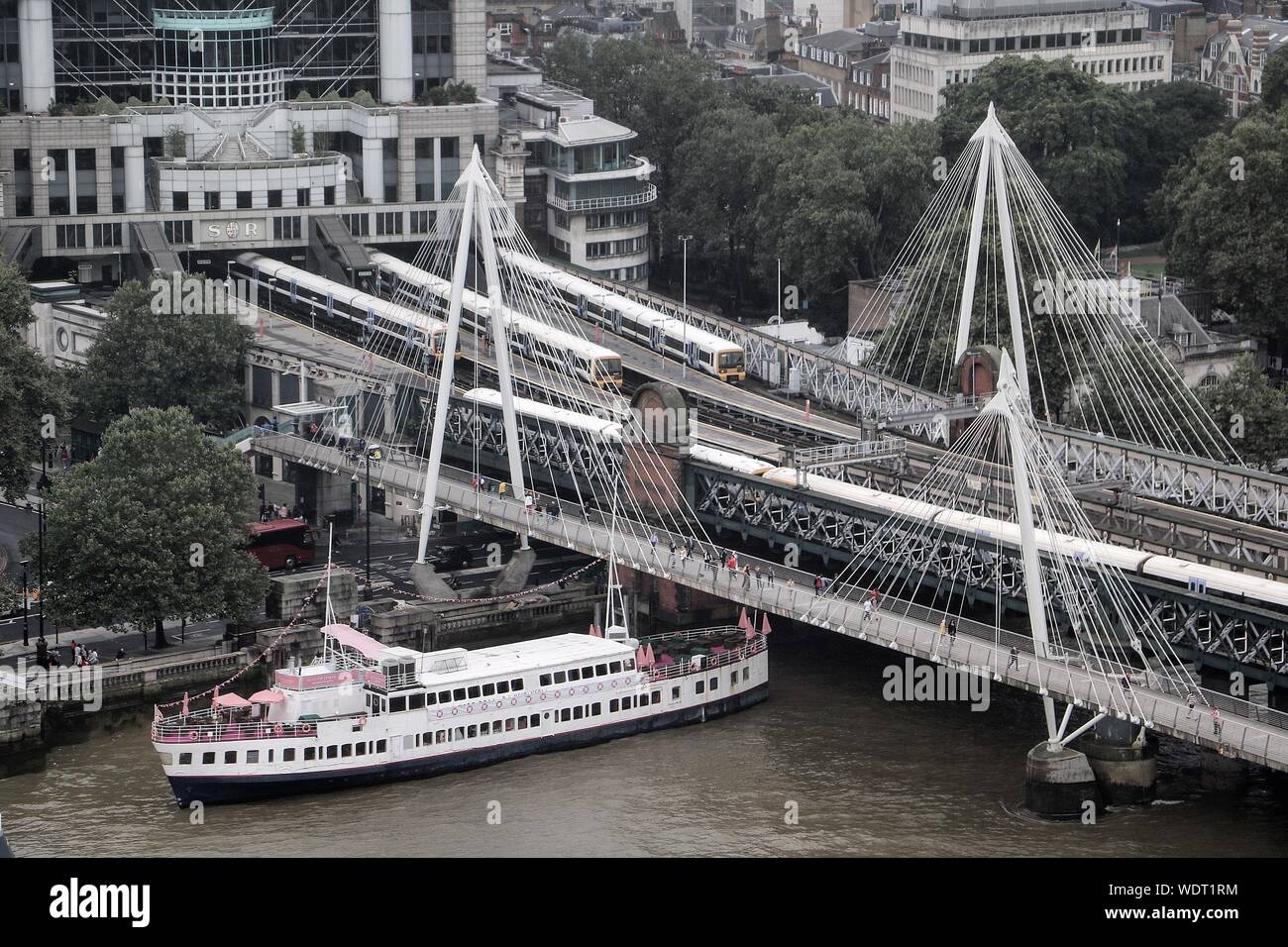 High Angle View Of Golden Jubilee Bridge Over Thames River In City Stock Photo