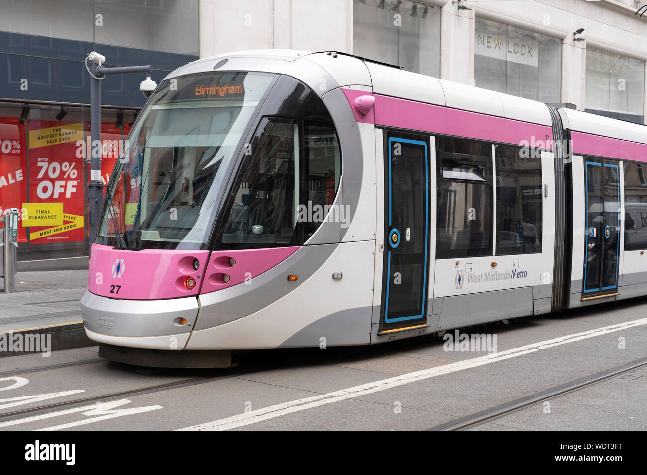 A tram on Corporation Street, Birmingham. Part of the West Midlands Metro, a light-rail / tramway network Stock Photo