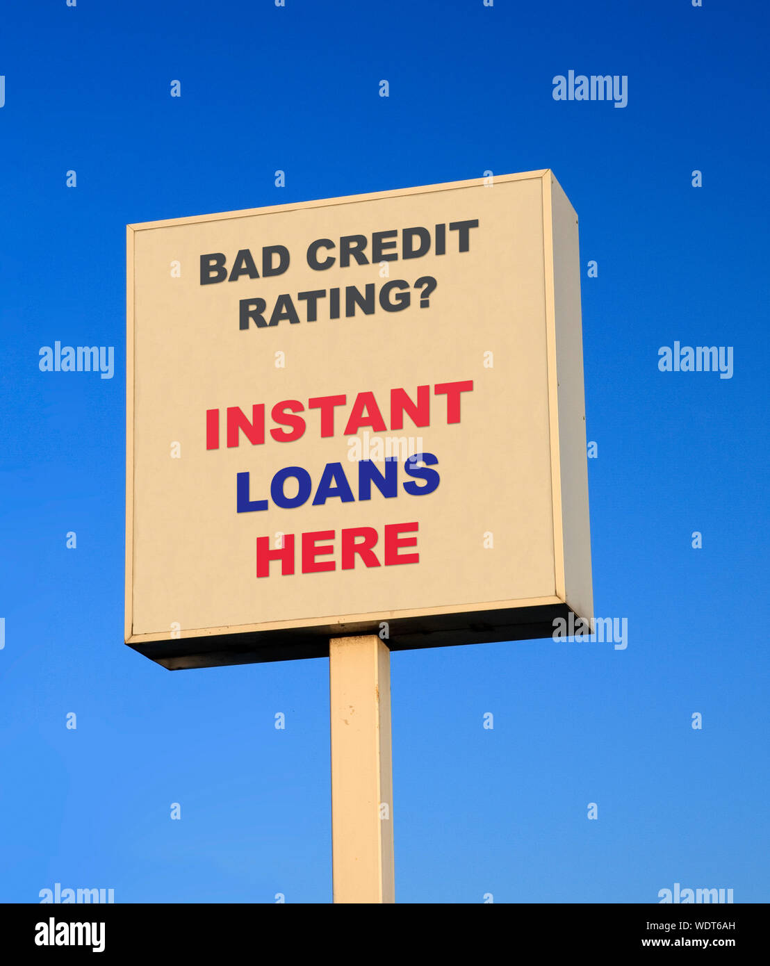 Large outdoor sign advertising instant loans for people with bad credit rating Stock Photo