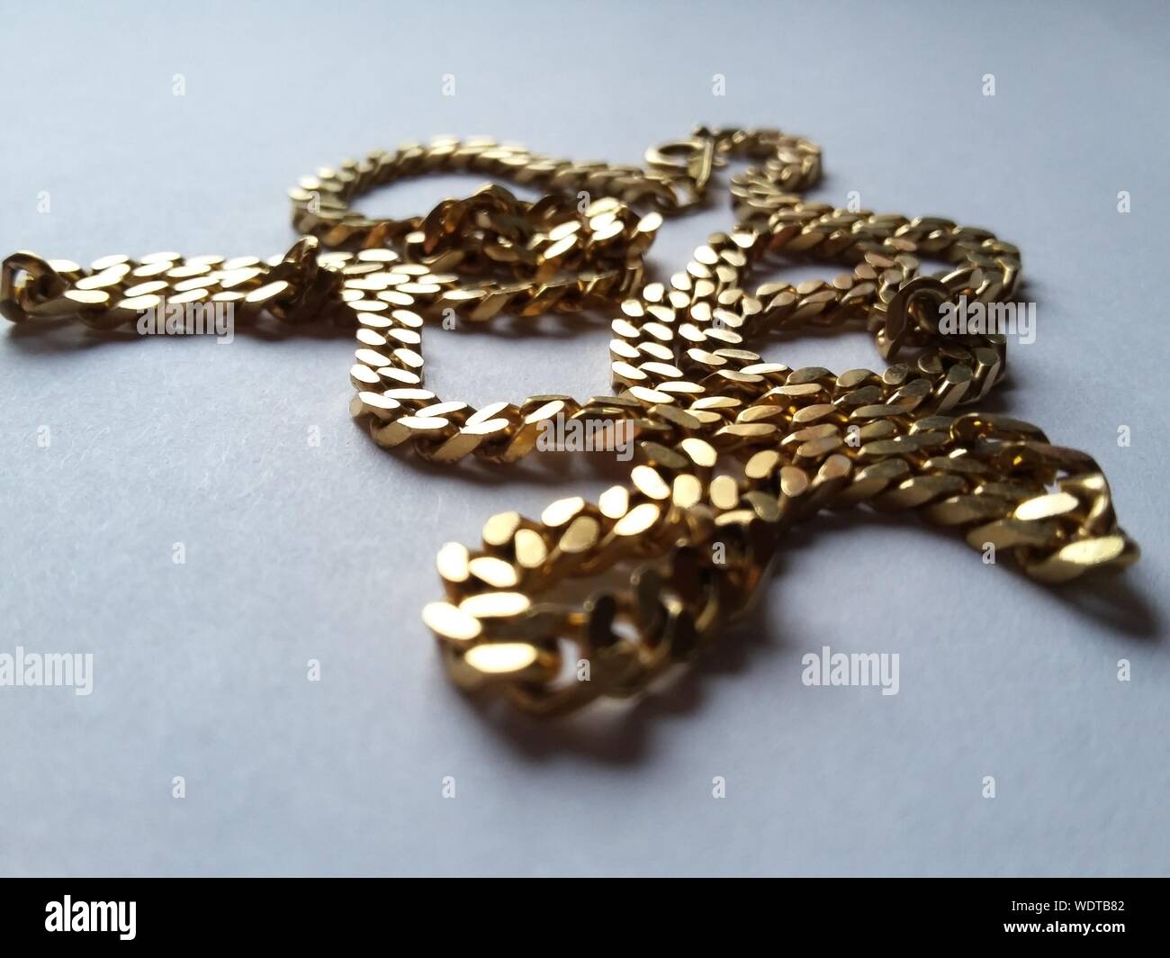 Gold fashion chain hi-res stock photography and images - Alamy