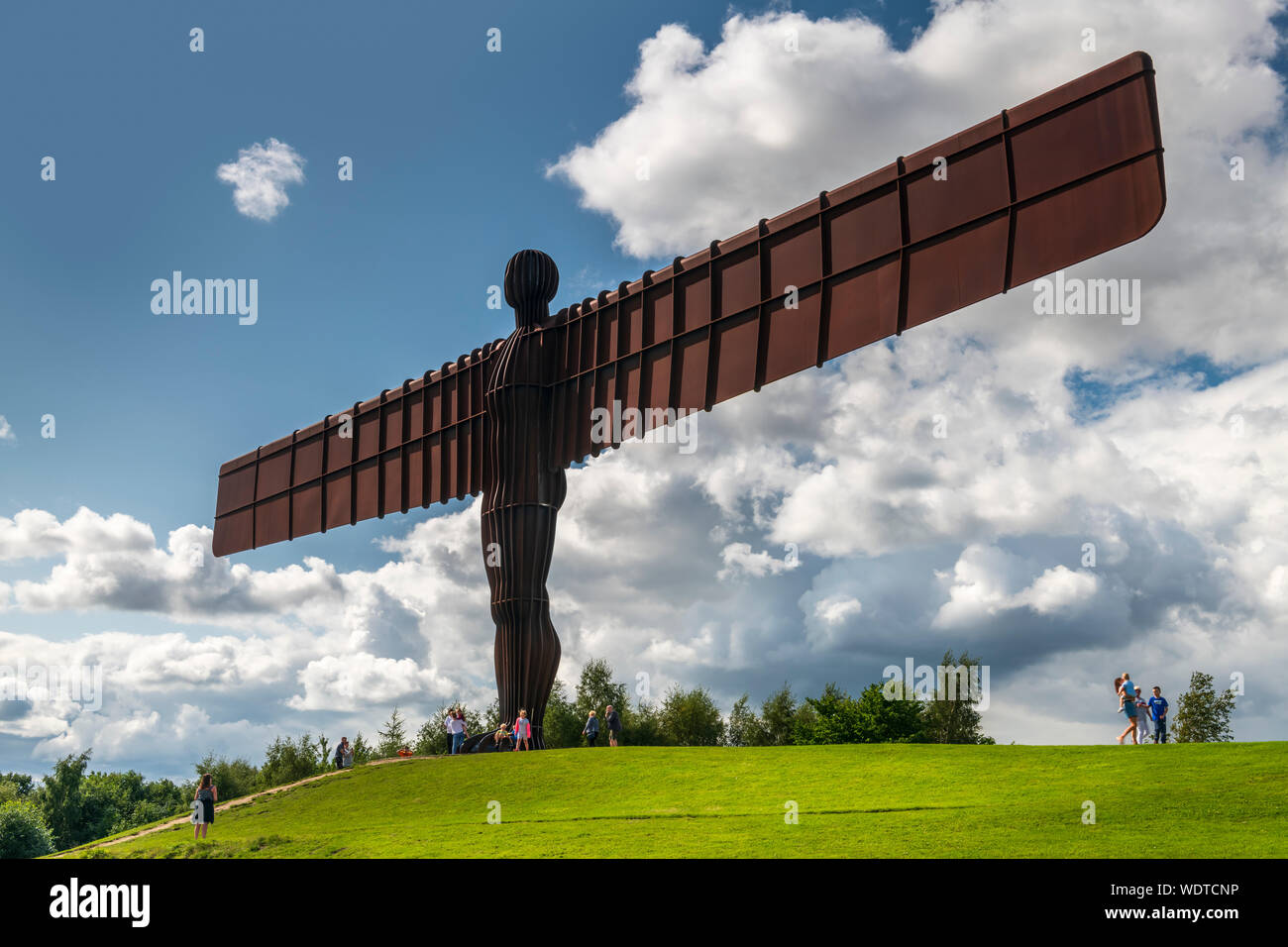 The Angel of the North is a contemporary steel sculpture located on a hill at Low Eighton in Gateshead, Tyne and Wear. It was designed by Antony Gorml Stock Photo