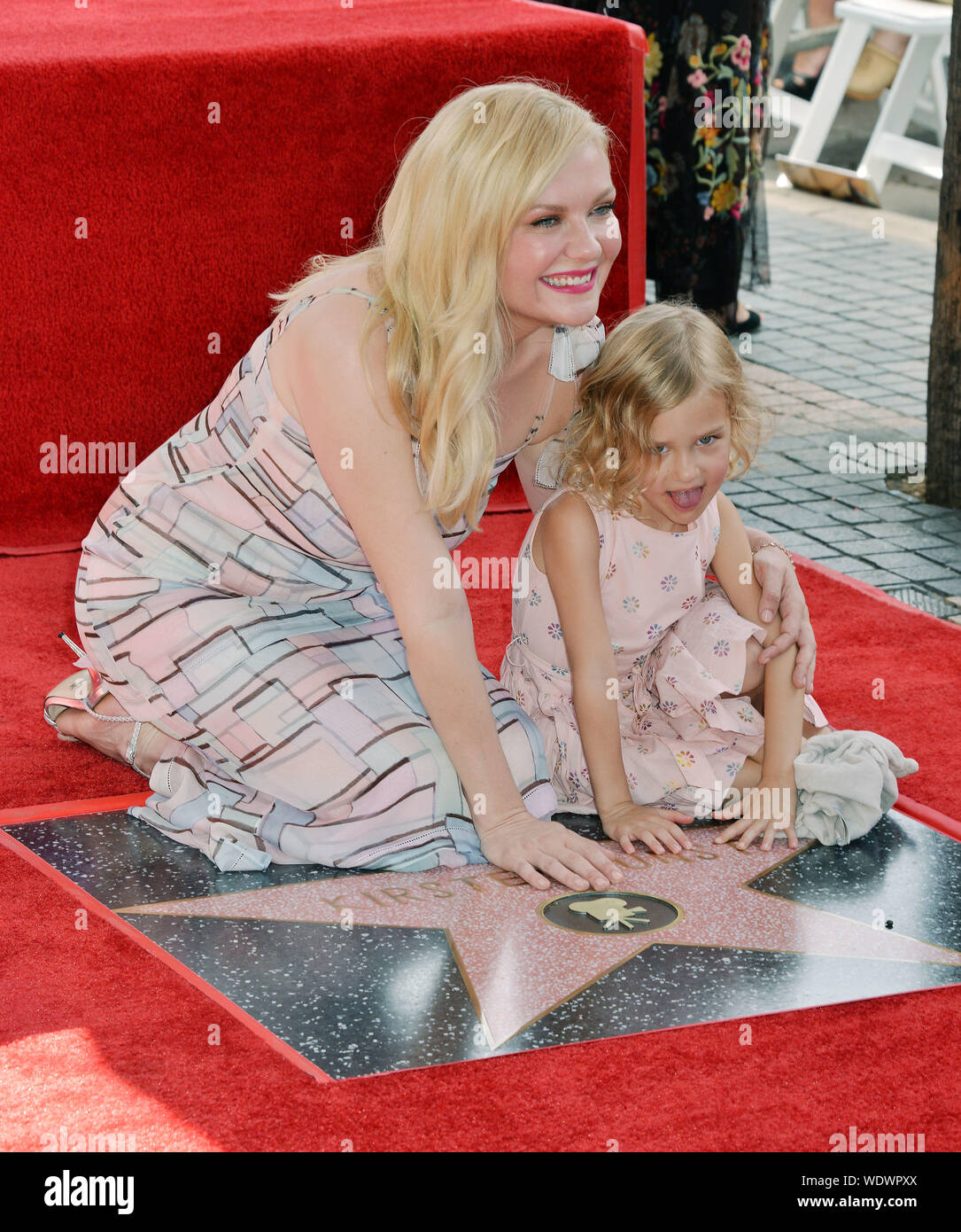 Los Angeles, USA. 29th Aug, 2019. a_Kirsten Dunst 009 and daughter attend as Kirsten Dunst is honored with a Star on the Hollywood Walk of Fame on August 29, 2019 in Hollywood, California. Credit: Tsuni/USA/Alamy Live News Stock Photo