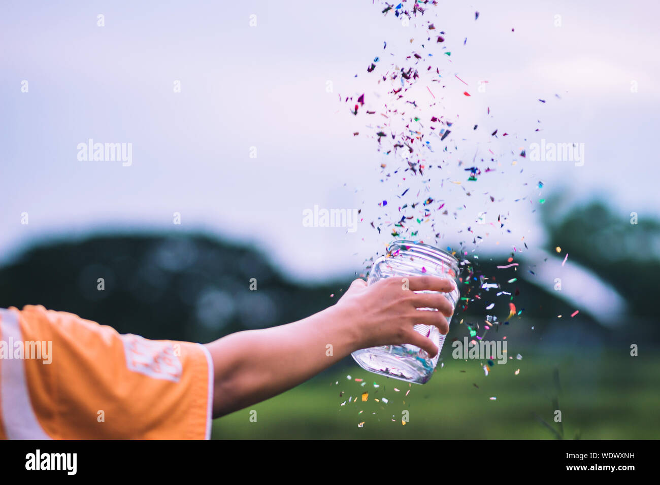 Hand Throwing Confetti High Resolution Stock Photography and Images Alamy
