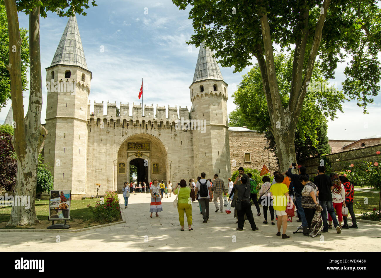 Istanbul, Turkey - June 6, 2016: Crowds of tourists enjoying the spectacular grounds and buildings of Topkapi Palace in Istanbul, Turkey. Stock Photo