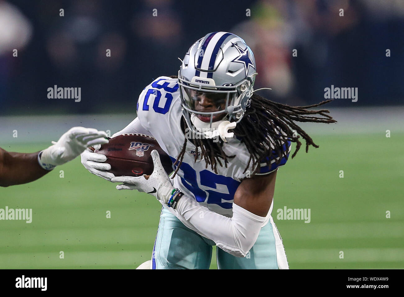 Aug 29, 2019: Dallas Cowboys cornerback Donovan Olumba #32 carries the ball  back for a touchdown after making an interception in the first quarter  during an NFL preseason game between the Tampa