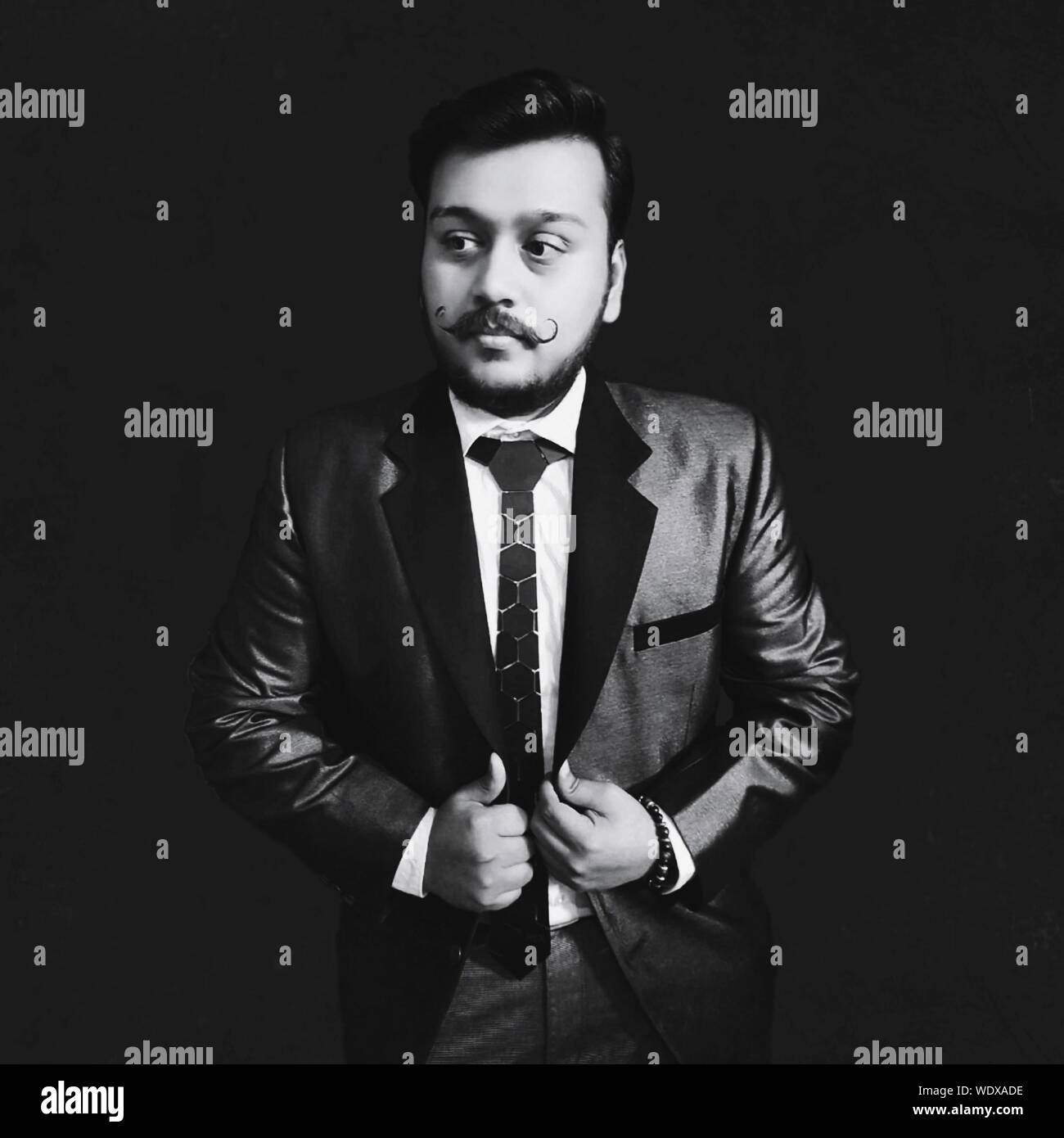 Man black suit hi-res stock photography and images - Alamy