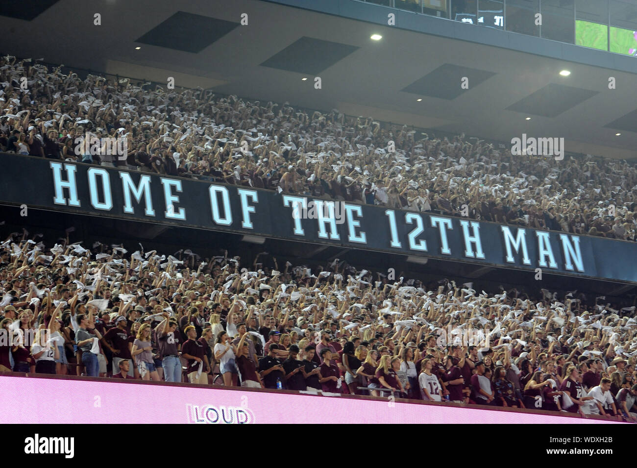 College Station, Texas, USA. 29th Aug, 2019. August 29, 2019: Texas A&M Aggies fans waving their rally flags on 3rd down during the game between the Texas State University Bobcats and the Texas A&M University Aggies at Kyle Field Stadium in College Station, TX. Texas A&M Aggies leads the first half against Texas State Bobcats, 28-0. Patrick Green/CSM Credit: Cal Sport Media/Alamy Live News Stock Photo