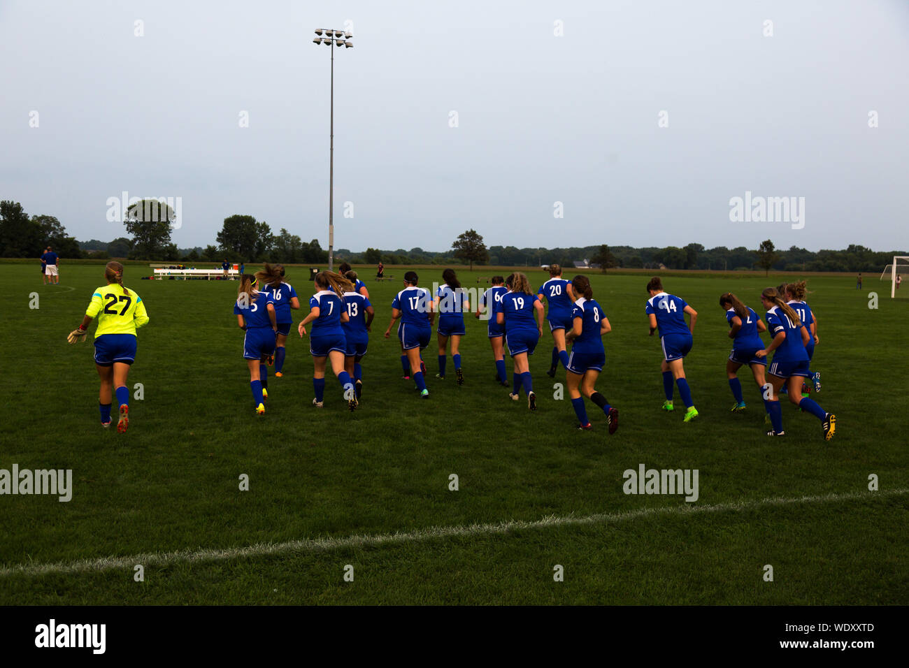 A high school girls' soccer team takes the field at Kreager Park in Fort Wayne, Indiana, USA. Stock Photo