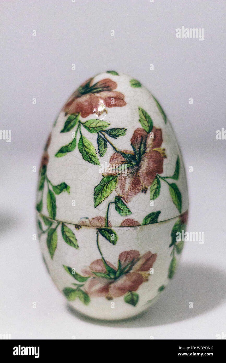 Close-up Of Egg Shaped Decoration Against White Background Stock Photo