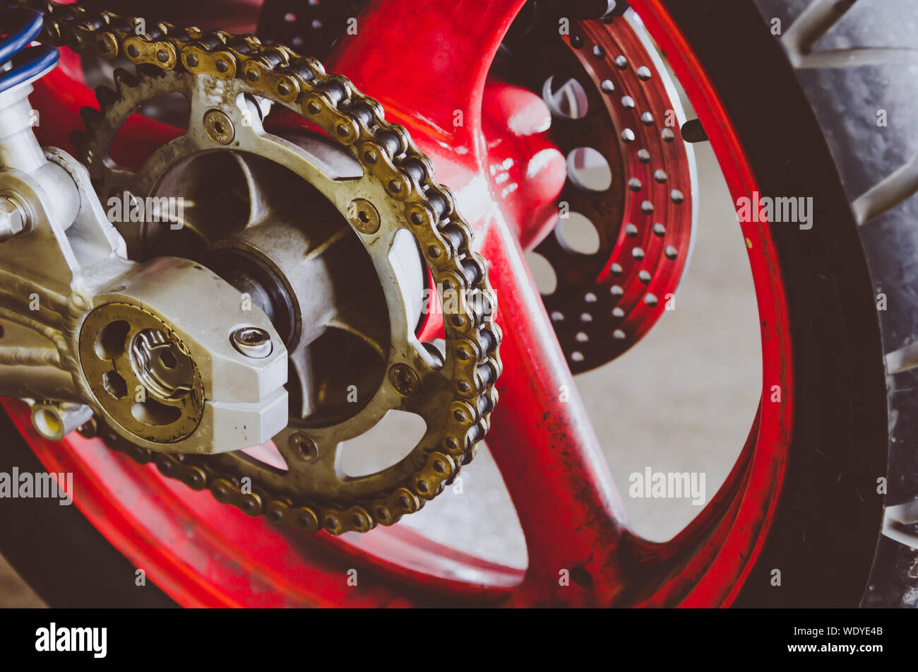 Motorcycle chain details on rear wheel Stock Photo Alamy
