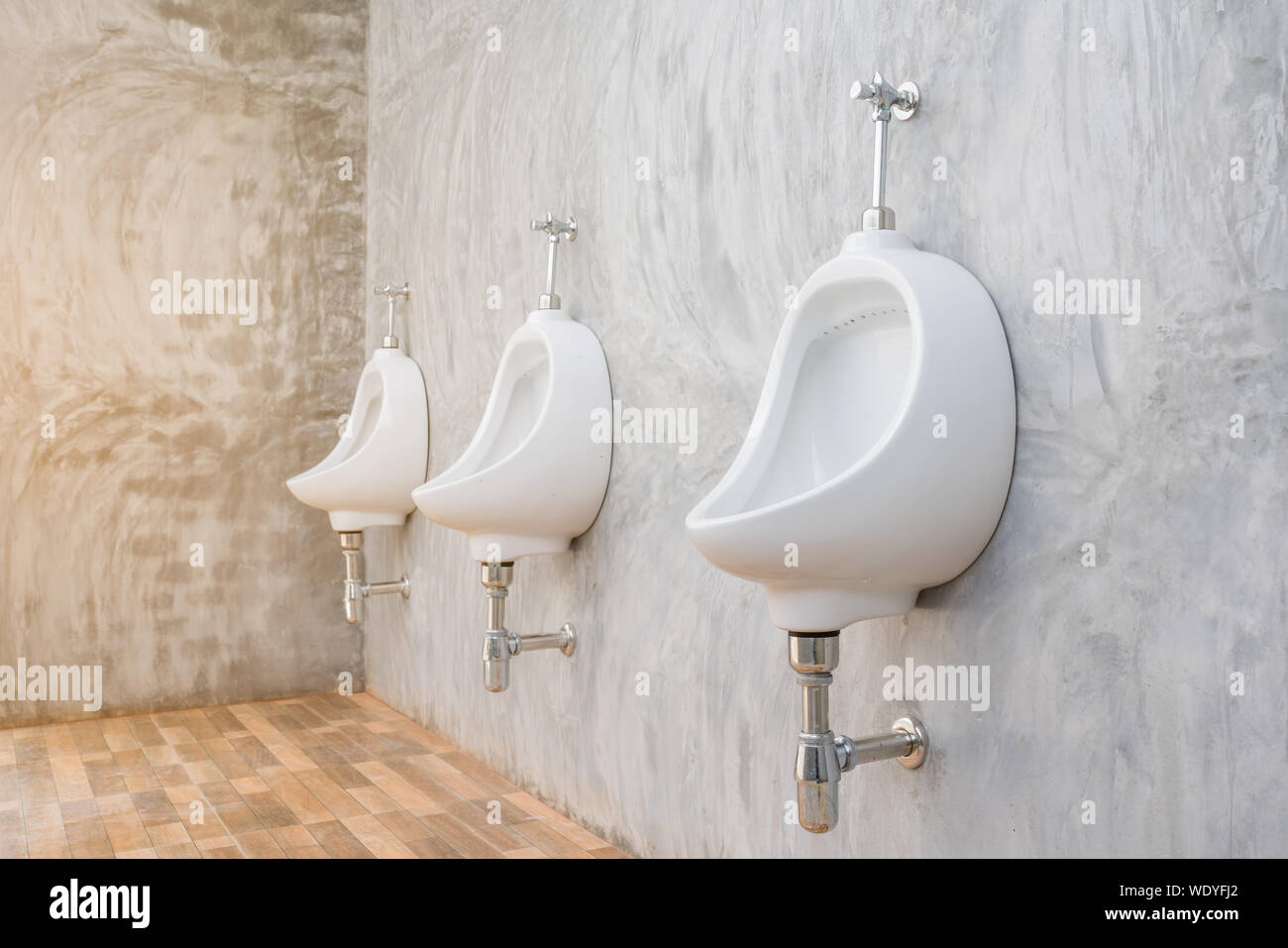 Urinals In Bathroom Stock Photo Alamy