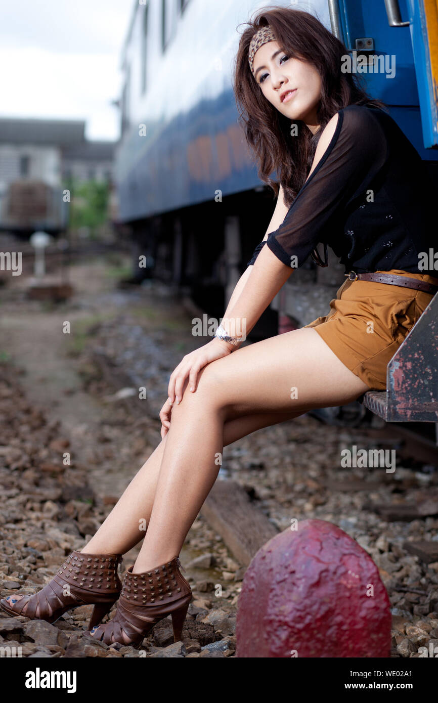 Woman on train and sitting hi-res stock photography and images - Alamy