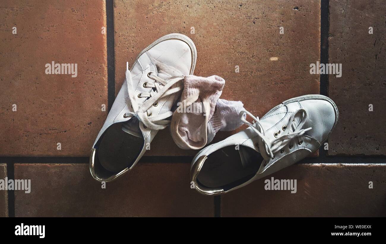 Download High Angle View Of Shoes And Socks On Floor Stock Photo Alamy PSD Mockup Templates