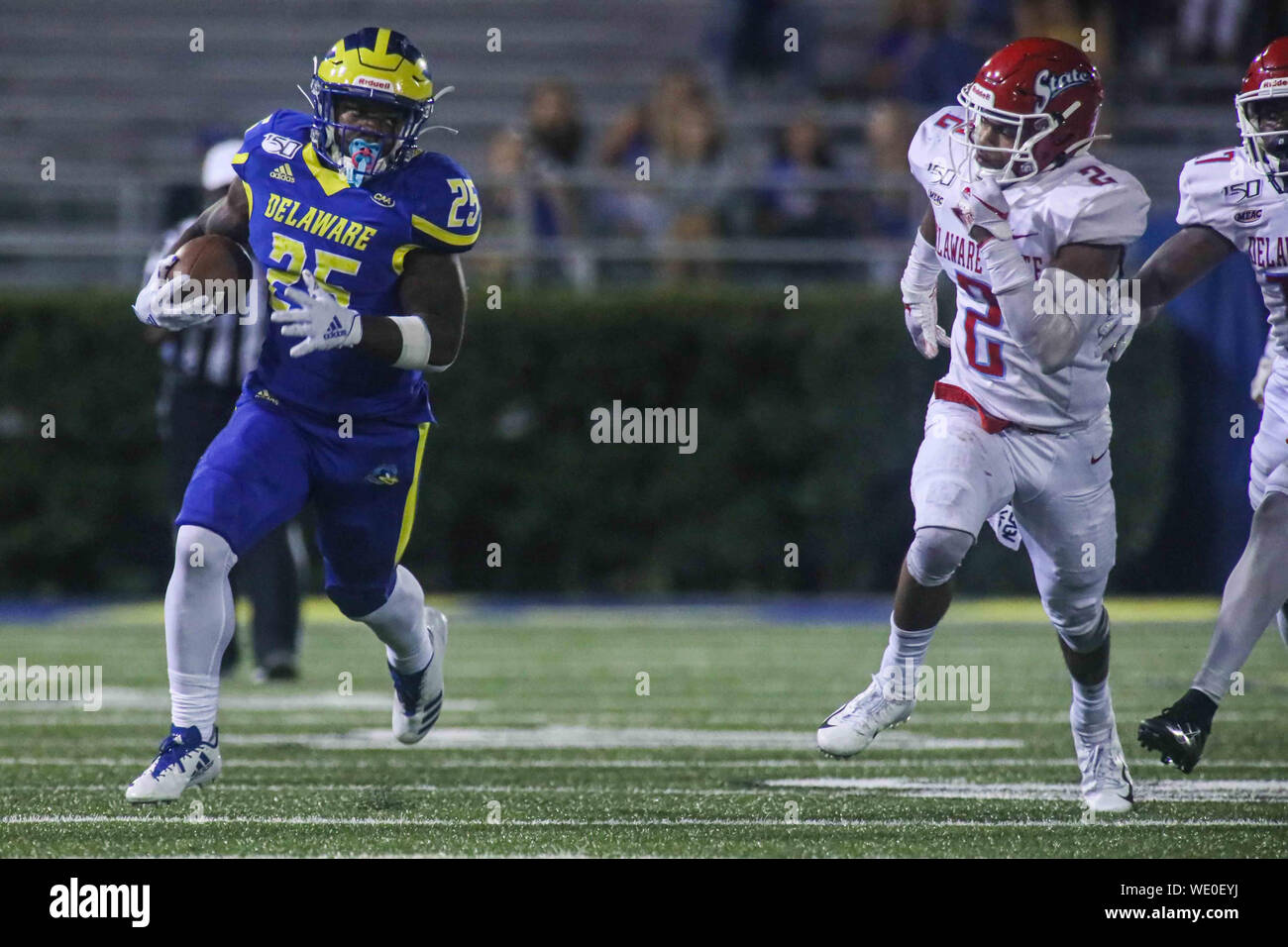 Newark, Delaware, USA. 30th Aug, 2019. Delaware Running Back WILL KNIGHT (25) breaks free and picks up 61 yards on the run during a week one game between the Delaware Blue Hens and Delaware State Thursday, AUG. 29, 2019, at Tubby Raymond Field at Delaware Stadium in Newark, DE. Credit: Saquan Stimpson/ZUMA Wire/Alamy Live News Stock Photo