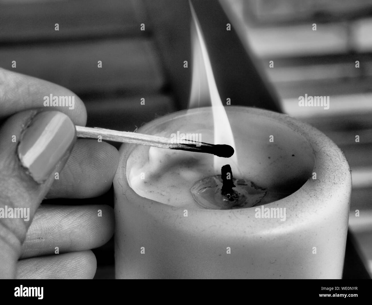 Hand holding candle home hires stock photography and images Alamy