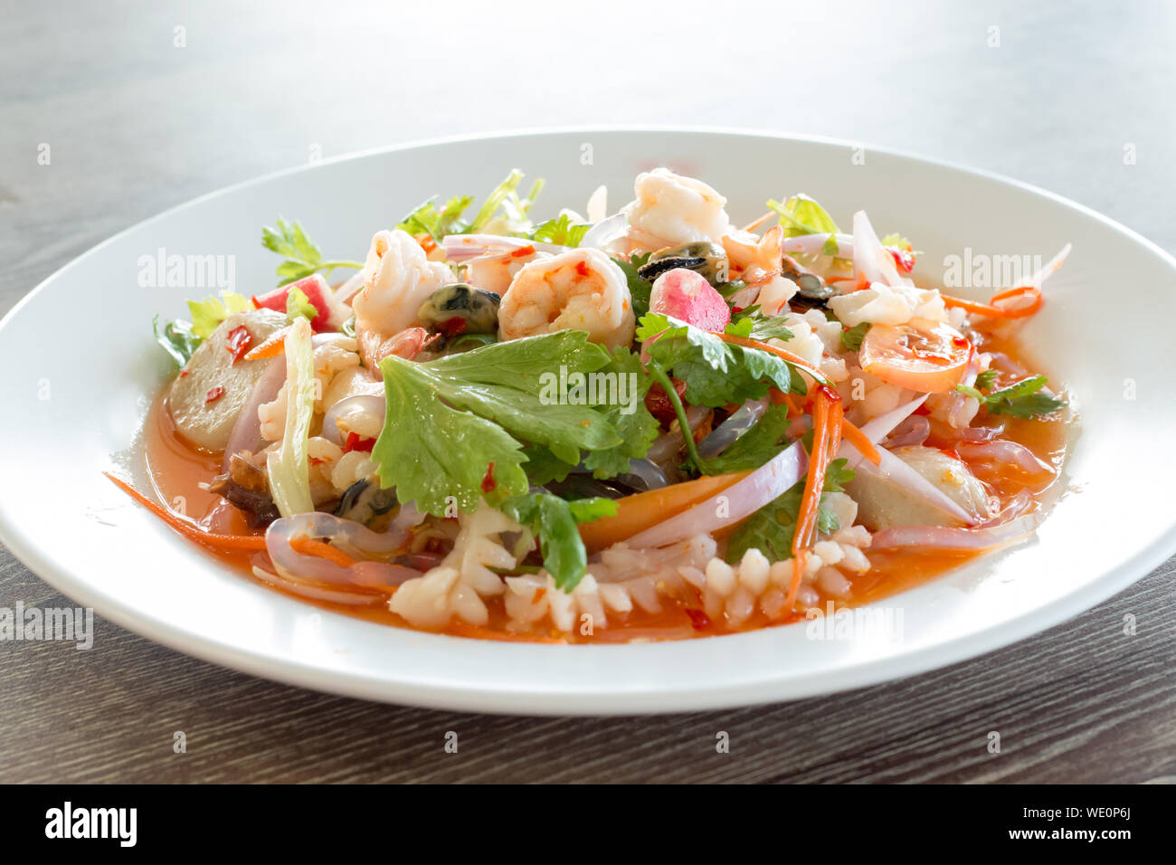 Close-up Of Sea Food Salad On Table Stock Photo