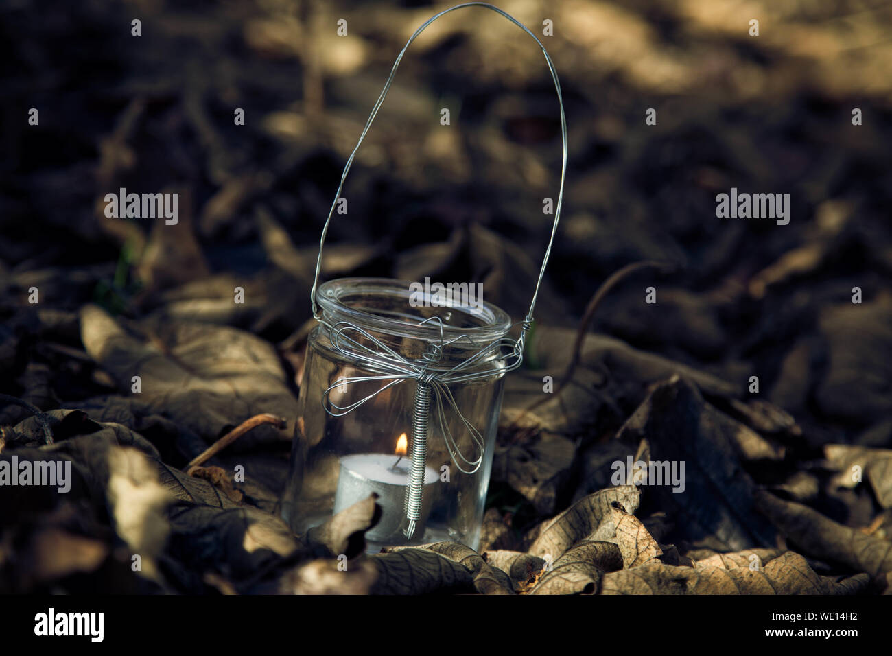 Burning candle in the jar hires stock photography and images Alamy