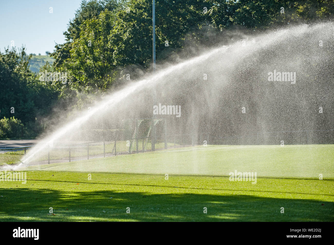 Sprinklers In Park Stock Photo Alamy