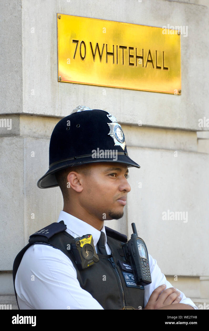 Black police officer hi-res stock photography and images - Alamy