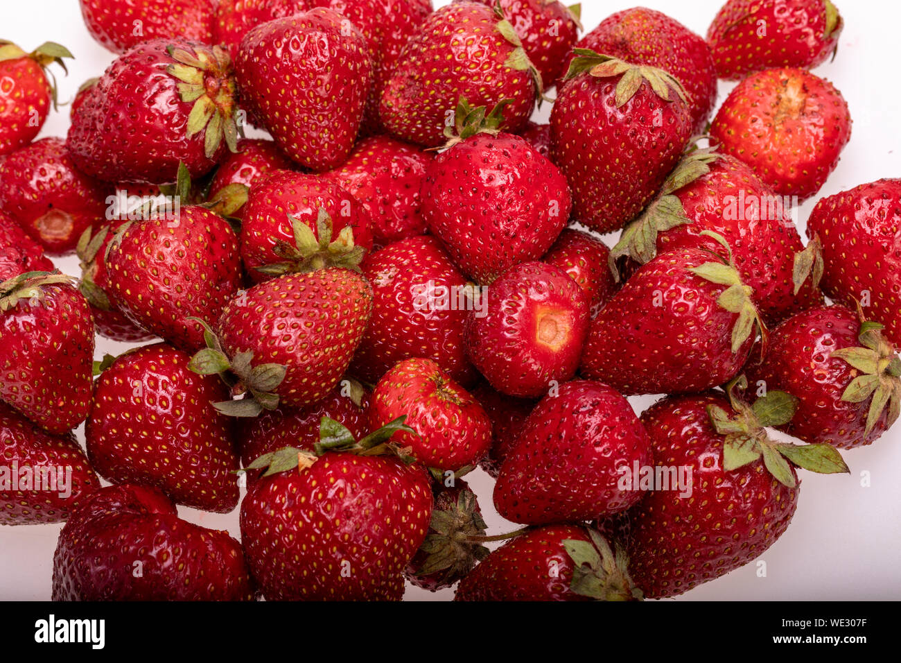 fresh ripe strawberries isolated on white background Stock Photo - Alamy
