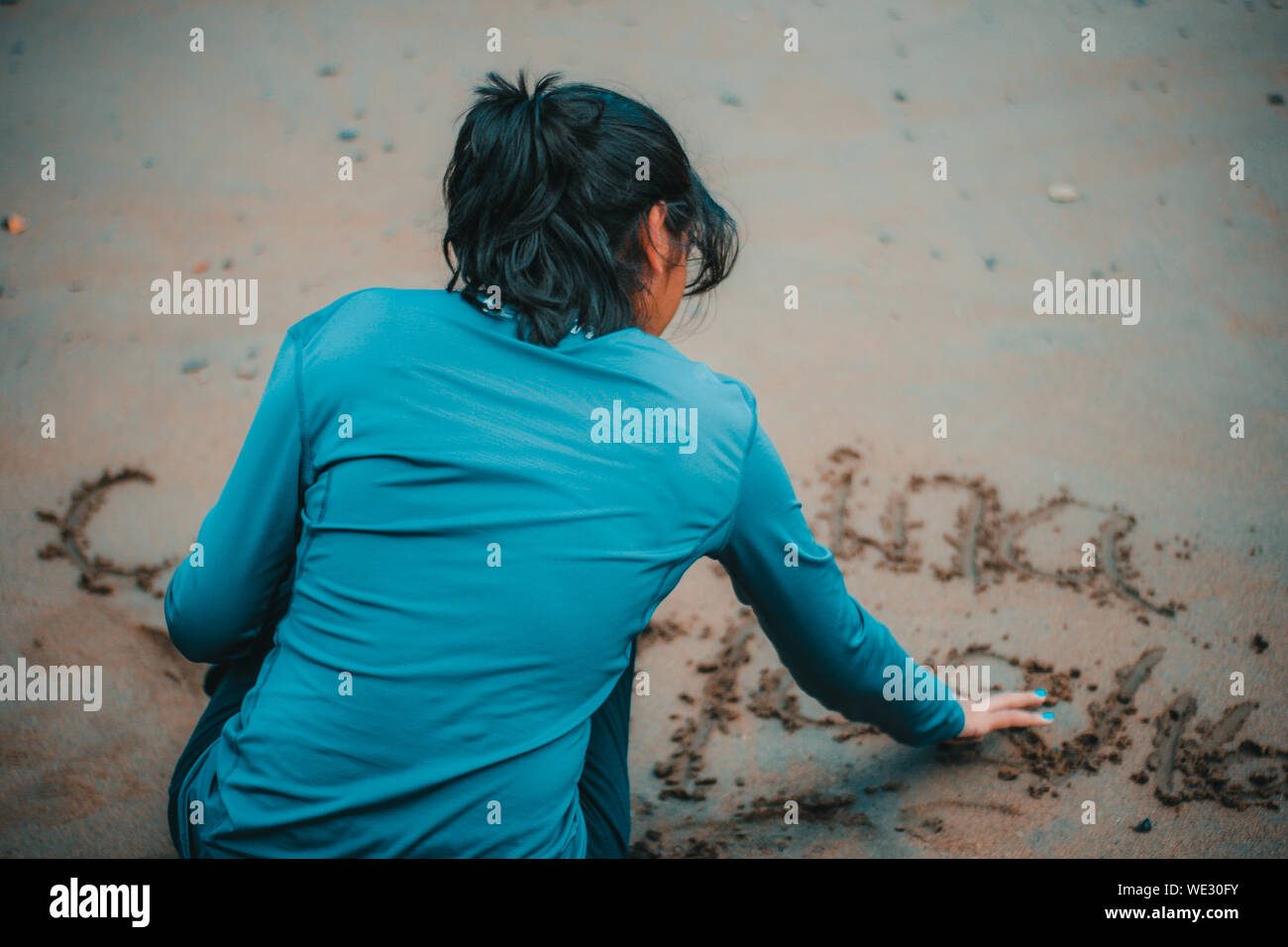 Rear back view crouching hi-res stock photography and images - Alamy