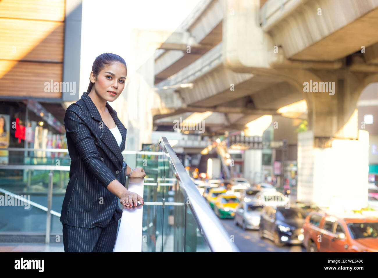 Asian Beautiful business woman in the evening light Stock Photo