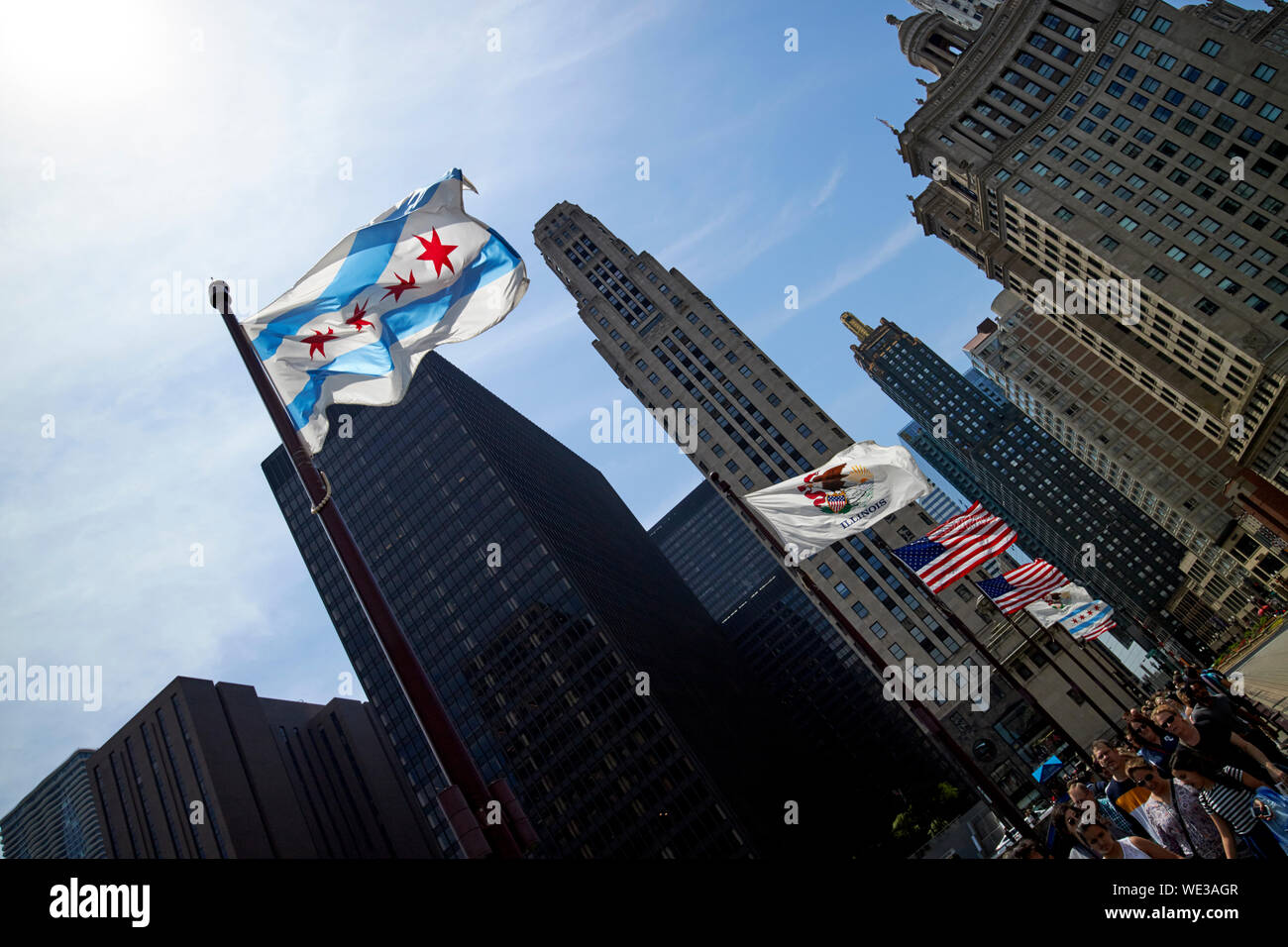 chicago illinois and united states of america flags flying on the dusable bridge michigan avenue windy city chicago Stock Photo